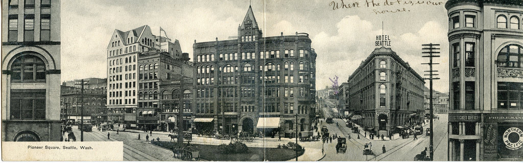 Panorama of Pioneer Square in 1906. The Occidental Hotel on the right was completed in 1890. Other buildings were in planning or under construction.