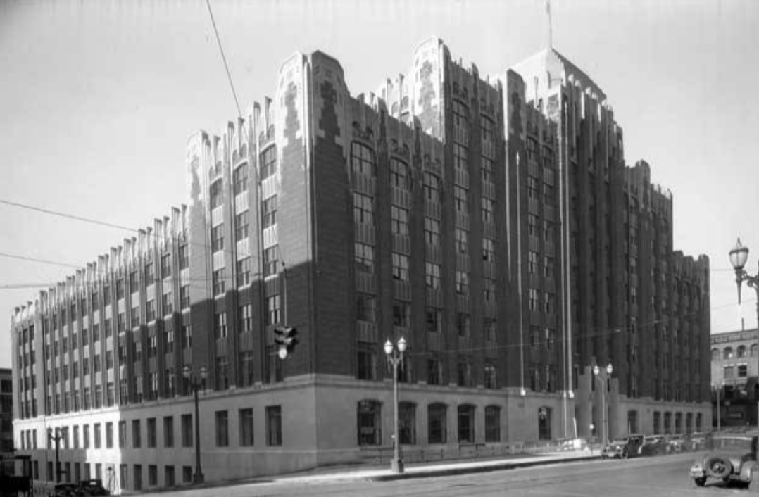 Photograph of the (Second) Federal Building, in Art Deco style. It steps up from 6 stories at the ends to 8 in the middle.