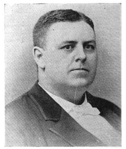 Photograph of Horace B. Dunbar, wearing a white bow tie on a white shirt with black coat. 
